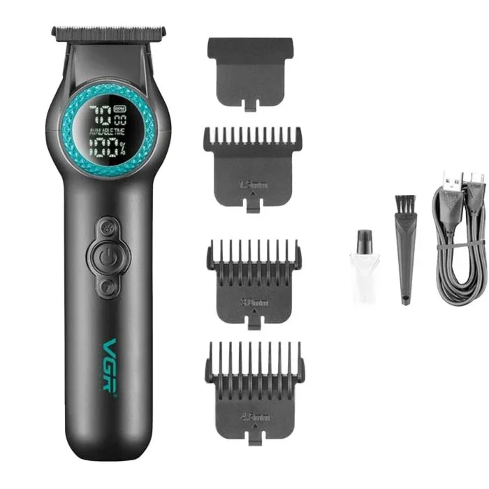 ماشین اصلاح موی سر و صورت وی جی ار مدل V-990، اصلاح به صورت صفر زن و حجم زن، با طراحی ارگونومیک، نمایش وضعیت باتری، منبع انرژی باتری قابل شارژ، دارای تیغه از جنس سرامیک، تکنولوژی اصلاح به صورت تریم، به همراه روغن، برس تمیزکننده و کابل شارژ USB
